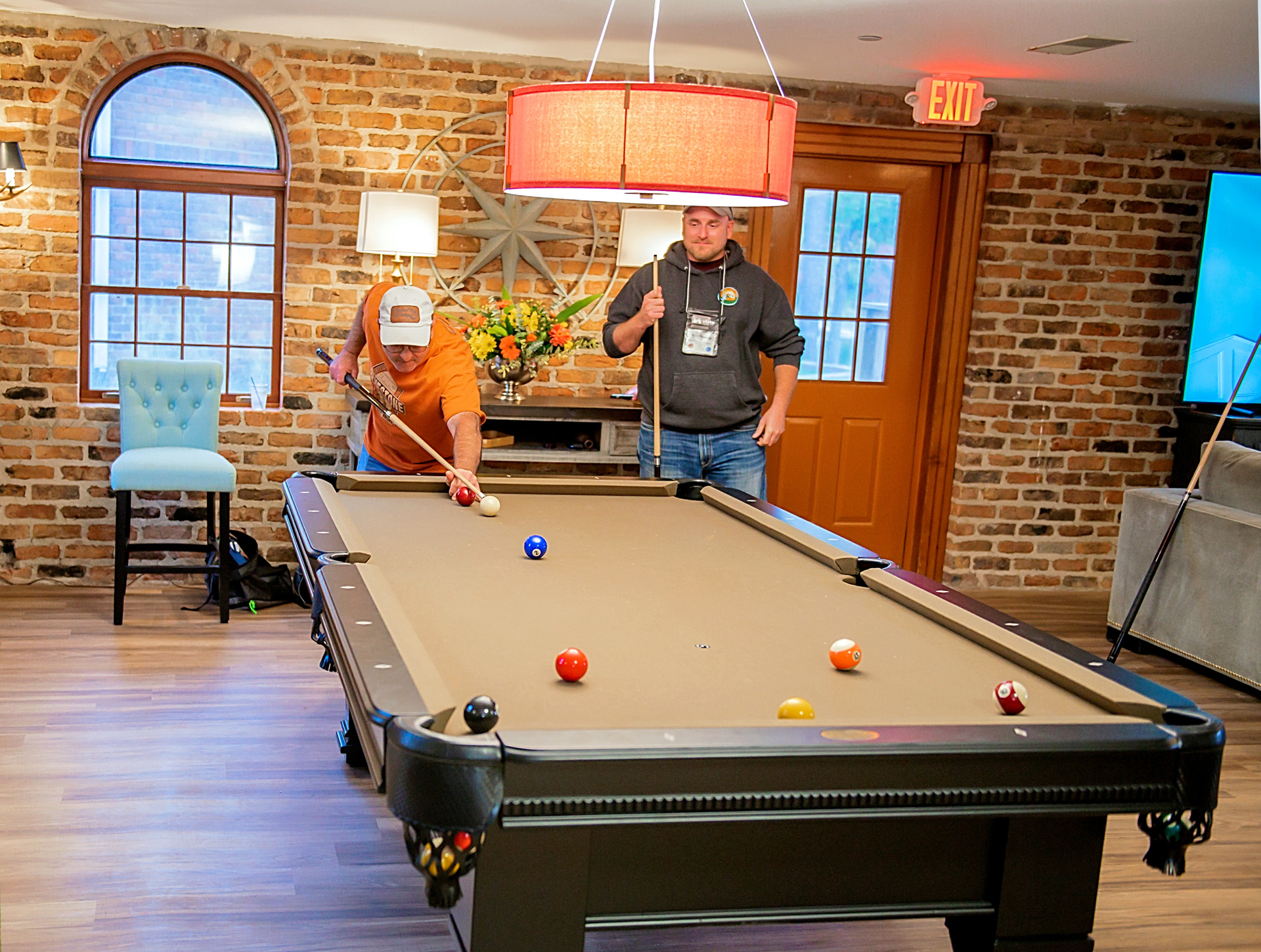 The 1842, a Hangout on the Ground Level with Walk-out to the Amphitheater of the Historic Clubhouse