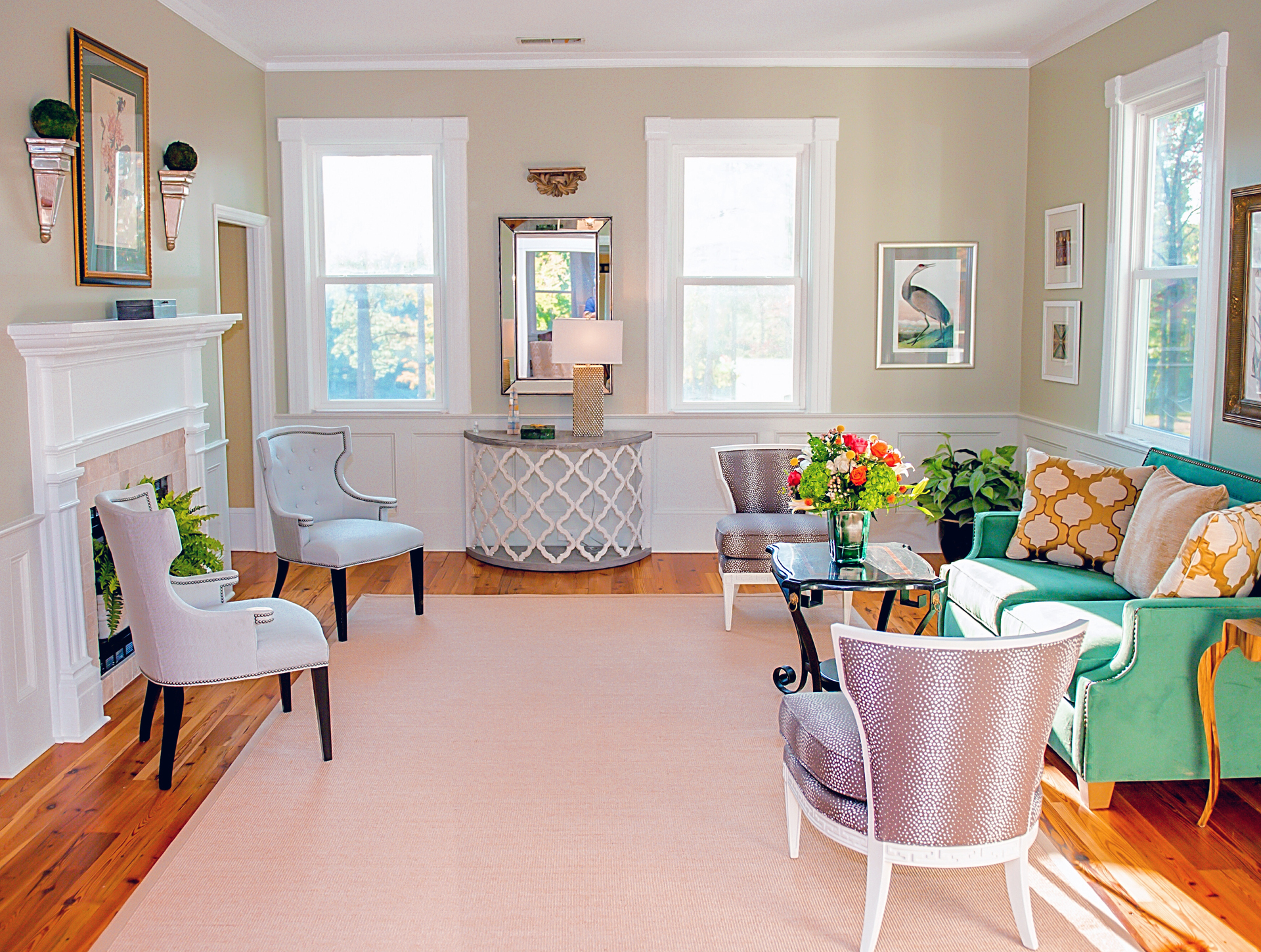There's plenty of natural sunlight and a working fireplace in the gathering room on the upper level of the Clubhouse at Stewart Landing