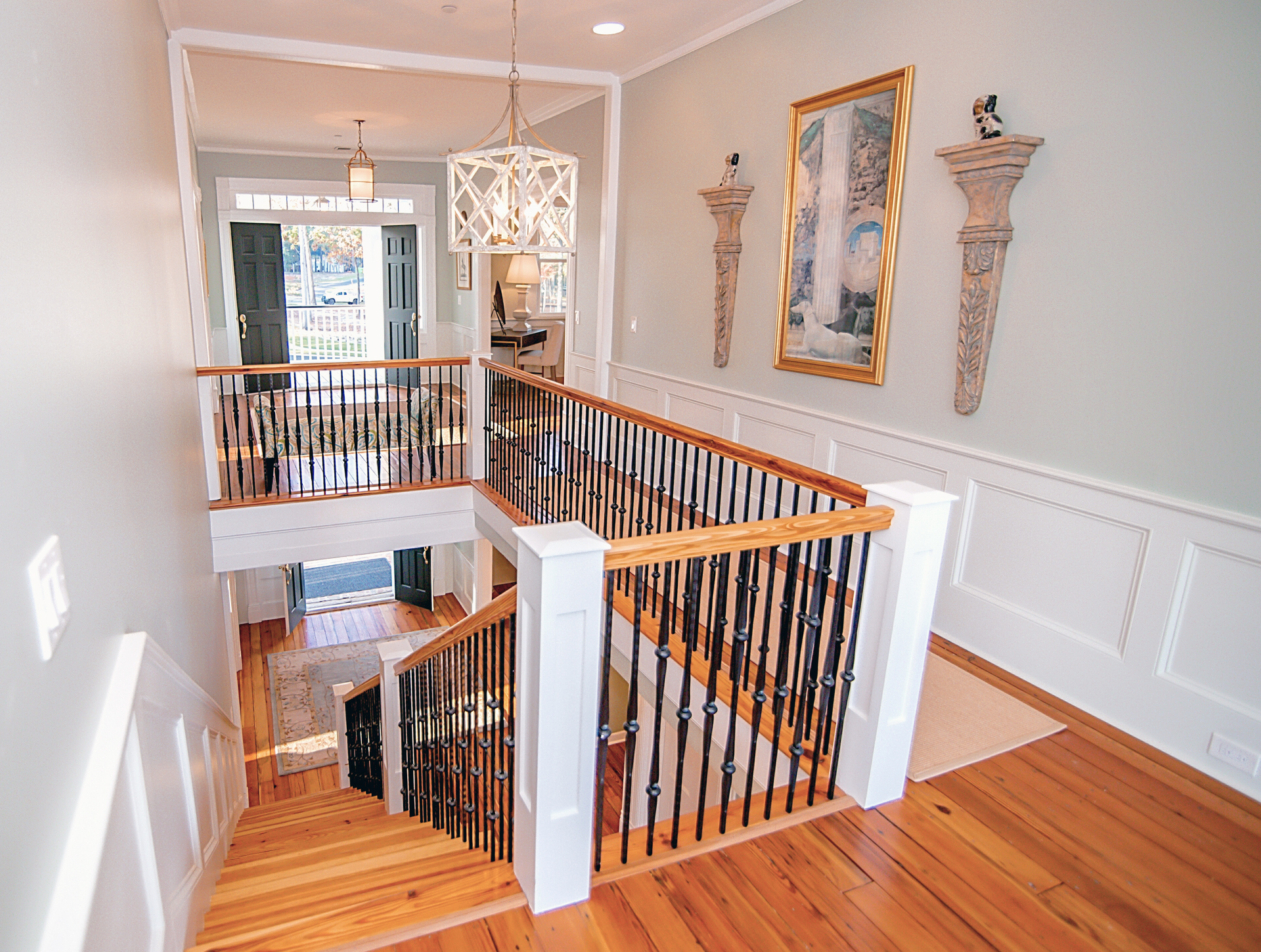 Gorgeous Stairwell from the Main Level to the Upper Level of the Clubhouse at Stewart Landing Featuring Two Porticoss