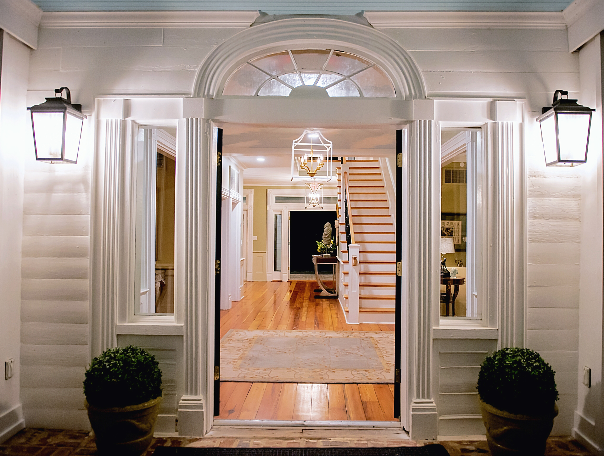 Bricks from the Original Stewart home were used to rebuild the entrance stairs leading to the double door front doors that open to the grand main foyer of the clubhouse at Stewart Landing