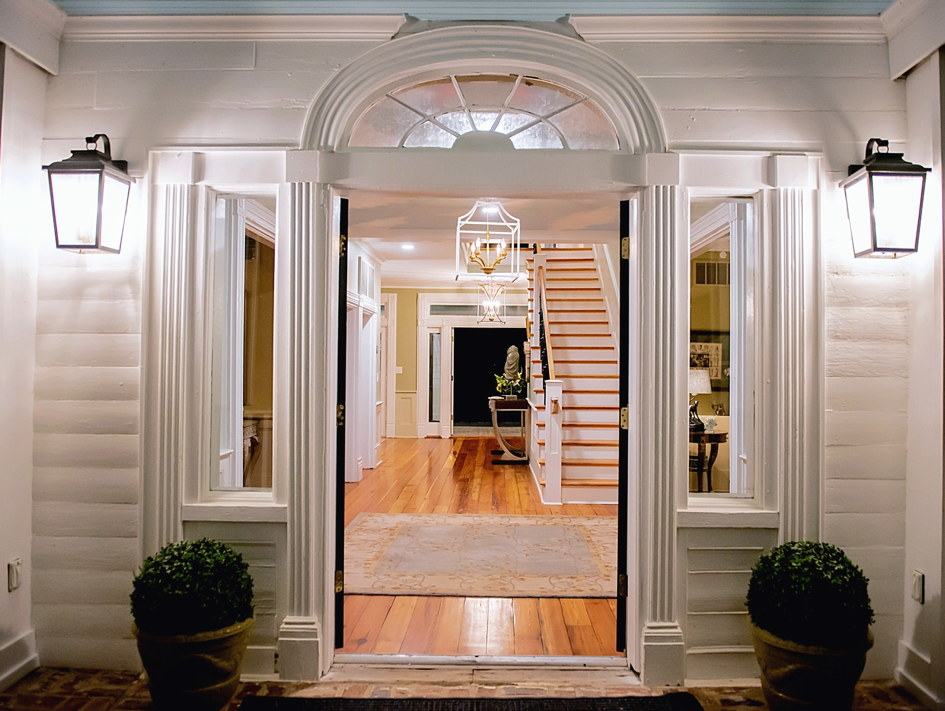 Bricks from the Original Stewart home were used to rebuild the entrance stairs leading to the double door front doors that open to the grand main foyer of the clubhouse at Stewart Landing