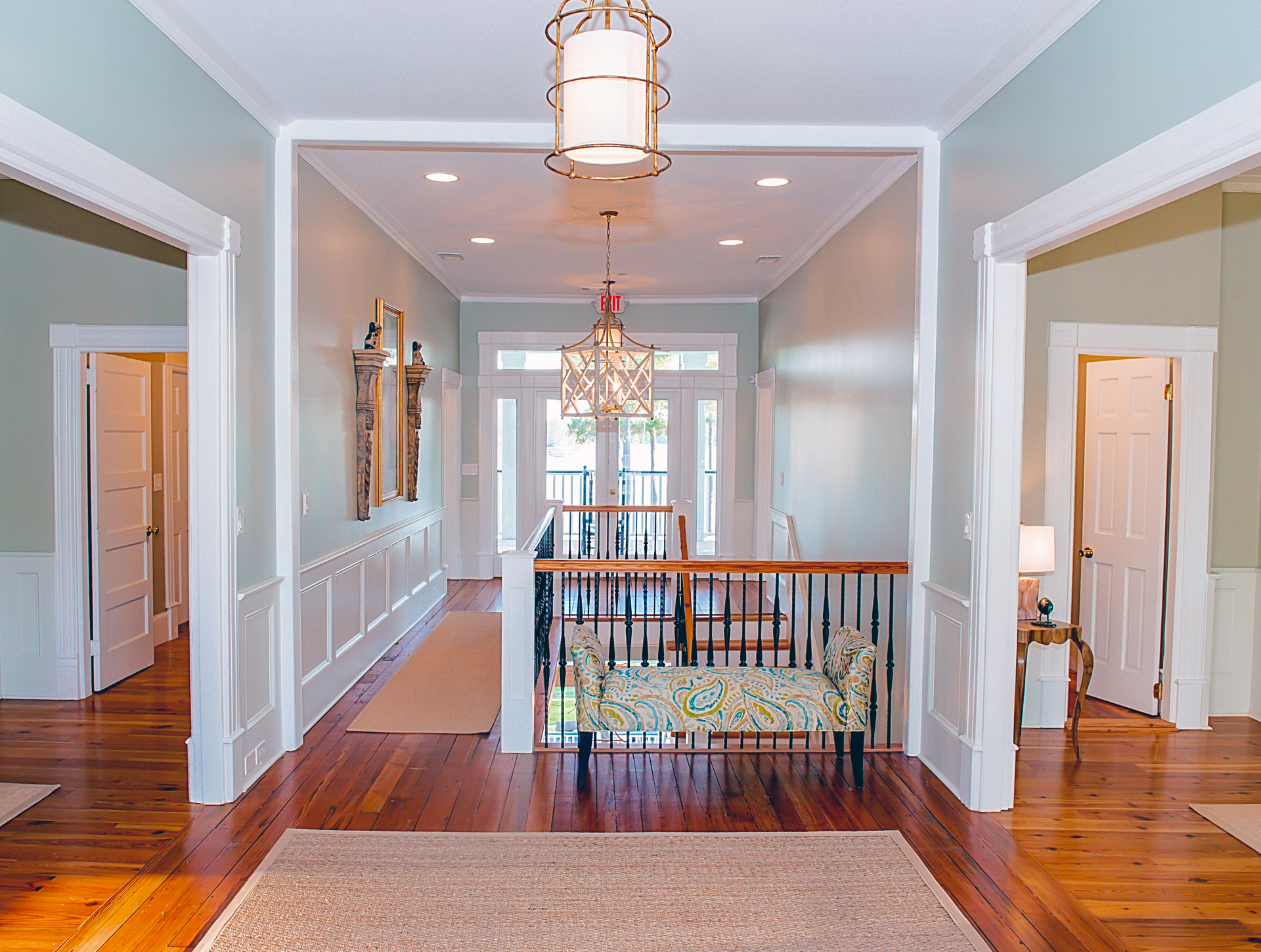 Gorgeous Stairwell from the Main Level to the Upper Level of the Clubhouse at Stewart Landing Featuring Two Porticos