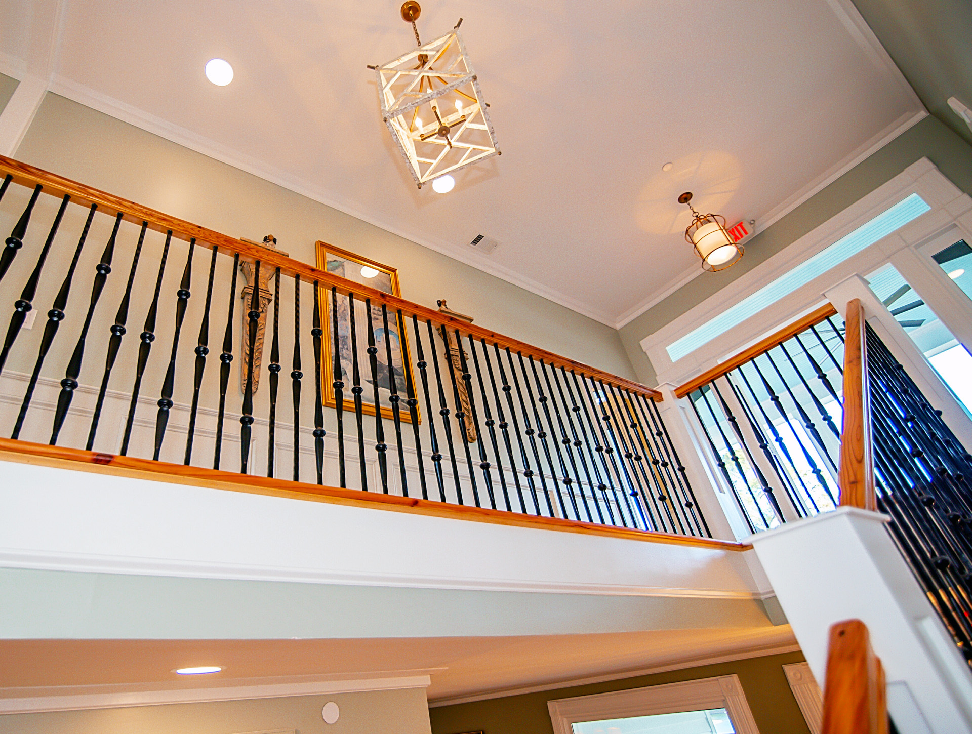 Gorgeous Stairwell from the Main Level to the Upper Level of the Clubhouse at Stewart Landing Featuring Two Porticos