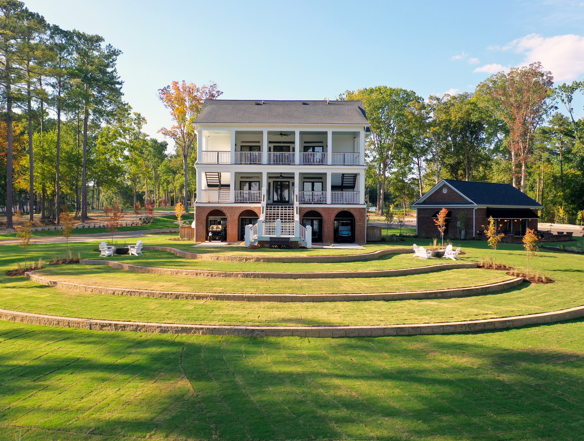 Aerial View of Fully Restored Historic Clubhouse, Amphitheater, Interactive Smart Gym, and Yoga Lawn