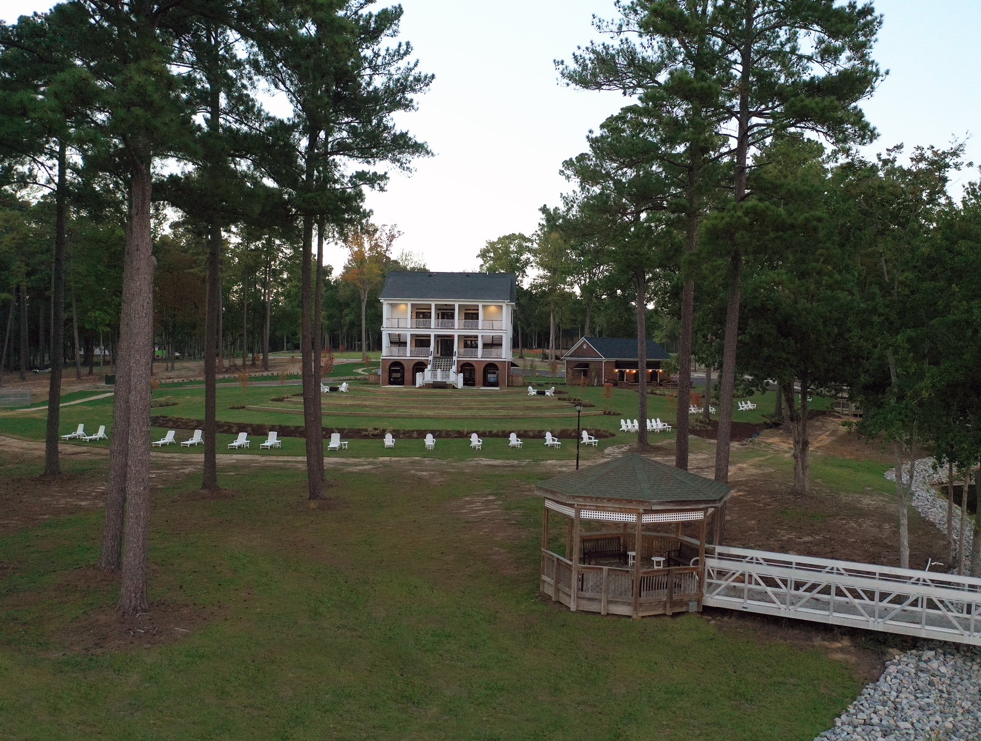 Aerial View of Fully Restored Historic Clubhouse, Amphitheater, Interactive Smart Gym, and Yoga Lawn