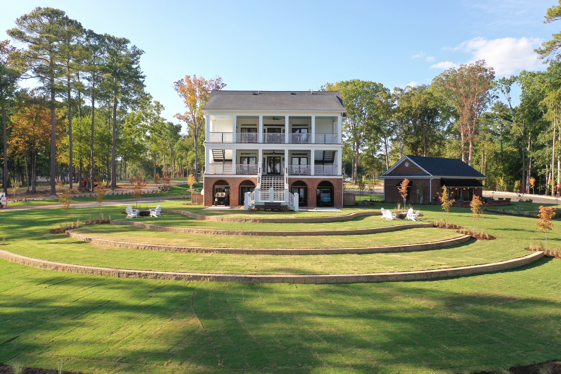 Aerial View of Fully Restored Historic Clubhouse, Amphitheater, interactive Smart Gym, and Yoga Lawn