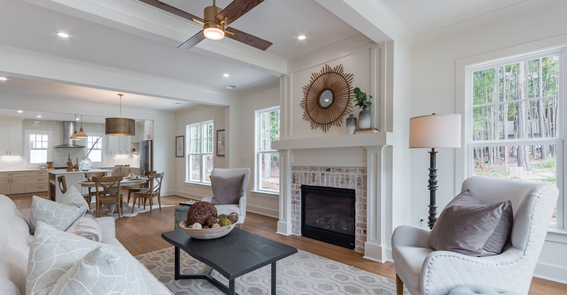 The Herschel by LaFaye Custom Homes Living Room with Fireplace Overlooking the Dining Room & Kitchen