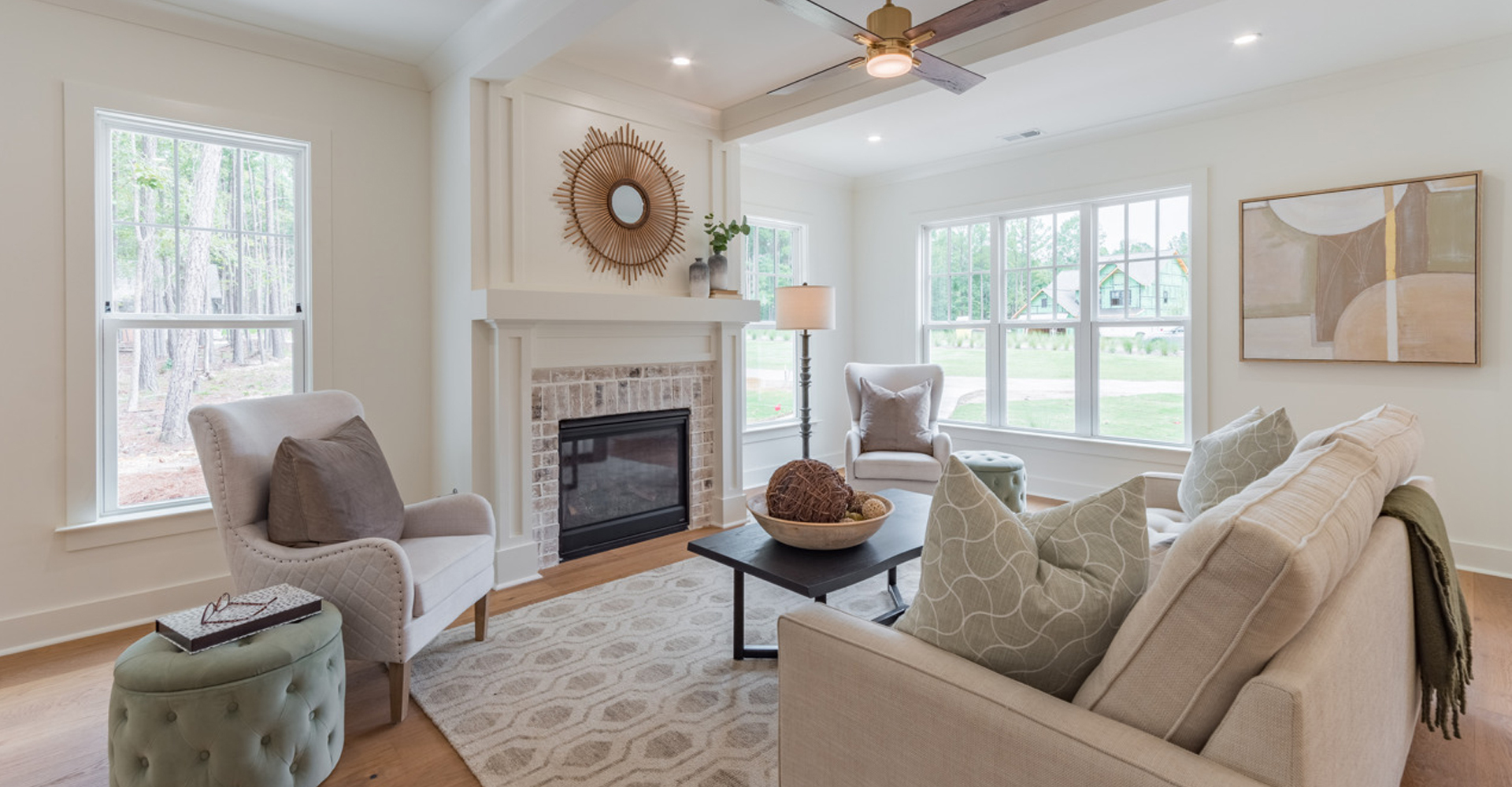 The Herschel by LaFaye Custom Homes Bright and Airy Living Room with Fireplace