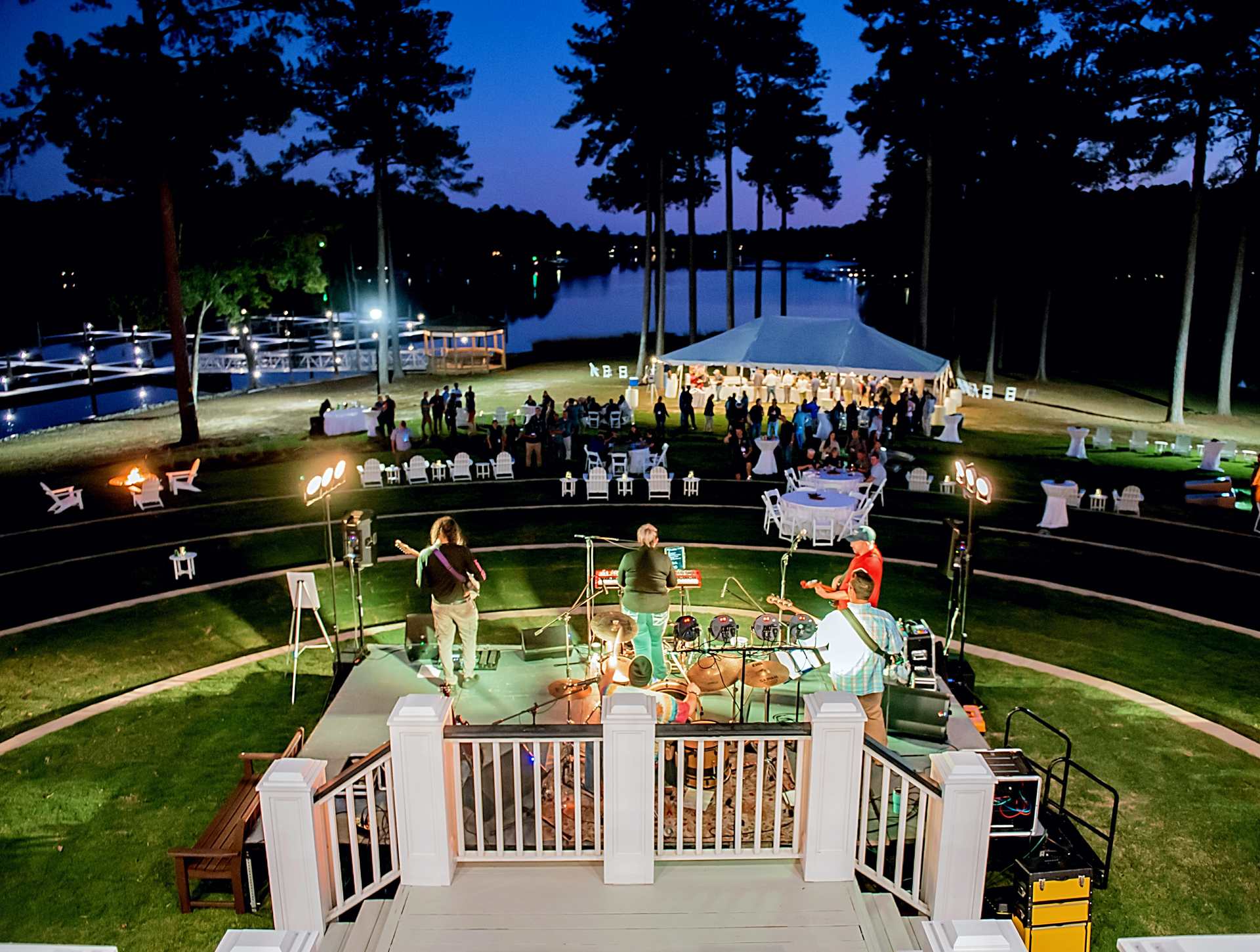 ADIRONDACk Chairs and fire pits await along the amphitheater and edge of the shoreline overlooking the private marina and lake at Stewart Landing on Lake Murray